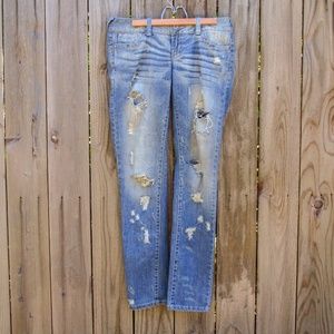 Low-rise Distressed Skinny Jeans